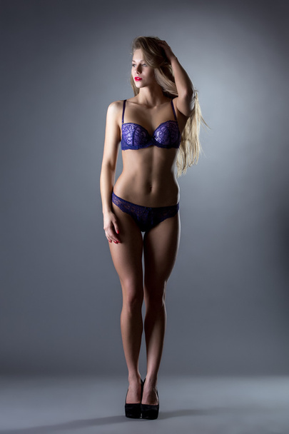 Attractive female model shows sexy lingerie - Φωτογραφία, εικόνα