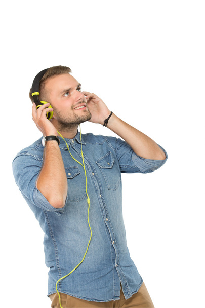 Young man with a headset on, isolated - Foto, imagen