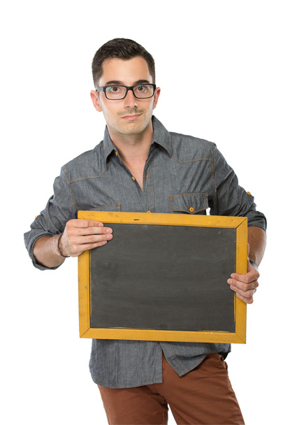 Young man holding a chalkboard - Фото, изображение