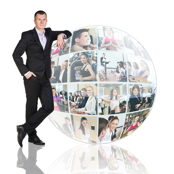 Man stands beside collage sphere - Photo, Image