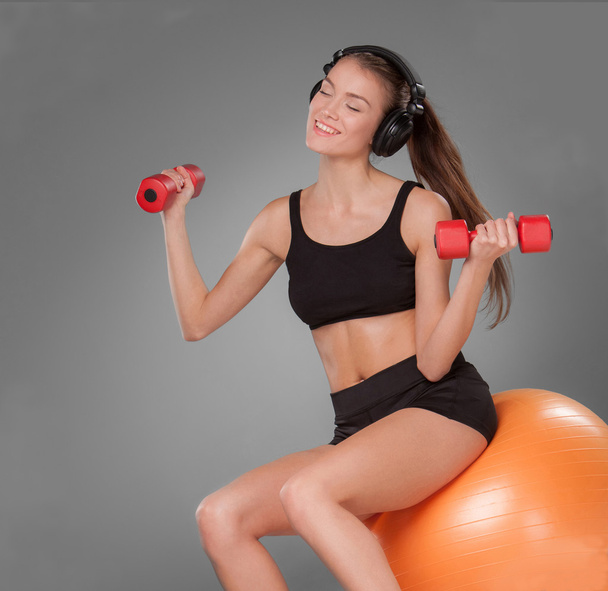 Sporty woman doing aerobic exercise - Fotó, kép