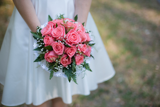 wedding bouquet in hands of bride - Foto, Imagen