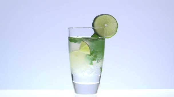 adding a sprig of mint in a mojito - Footage, Video