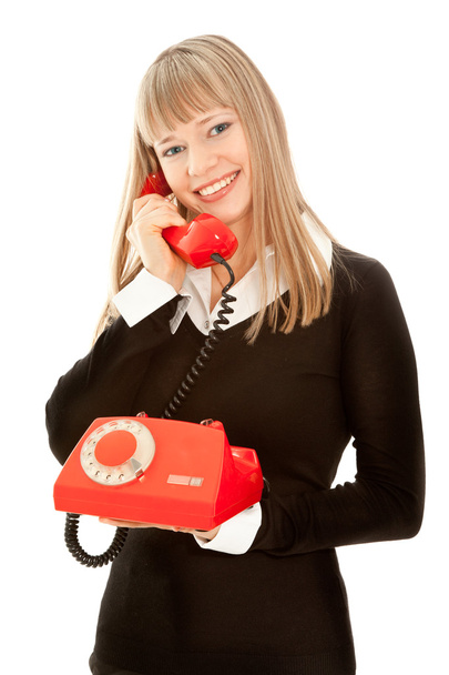 Smiling woman with old telephone - Foto, imagen