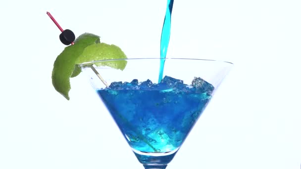 Pouring blue lagoon over crushed ice - Footage, Video