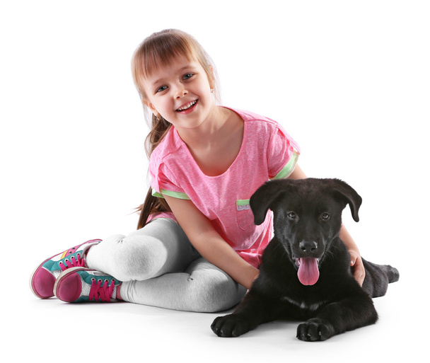 Little cute girl with puppy - Photo, image