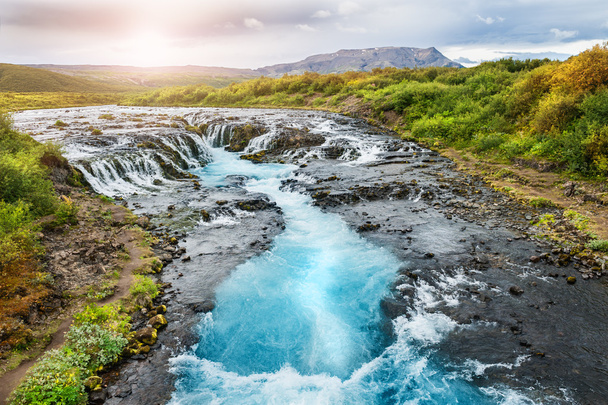 Beautiful Bruarfoss waterfall with turquoise water in Iceland - Photo, Image