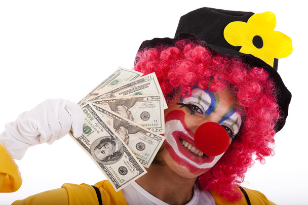 Funny clown holding money - 写真・画像