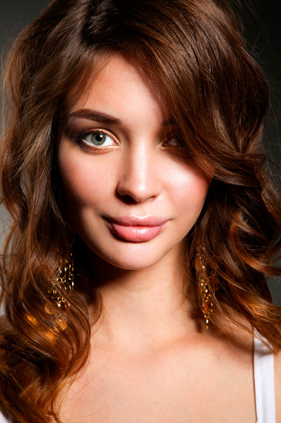 Close up portrait of beautiful young woman face. - 写真・画像