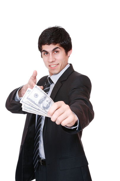 Businessman holds money in a hand - Foto, imagen