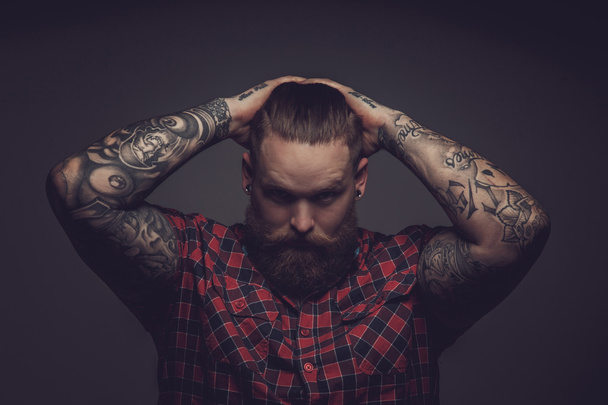 Brutal guy with beard and tattooes. - Photo, Image
