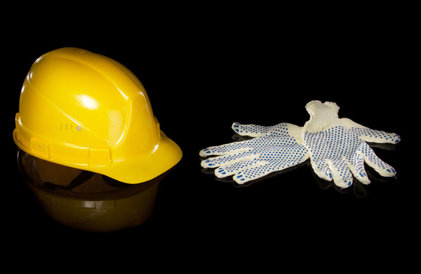 Hard hat and work gloves - Фото, изображение