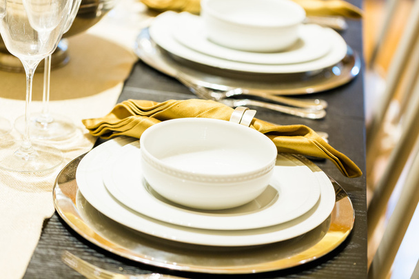 Table set with plates and silverware - Valokuva, kuva