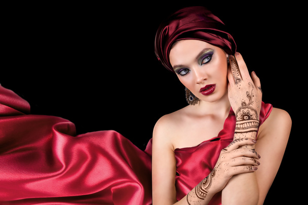 beautiful woman in oriental style with mehendi in hijab - Zdjęcie, obraz