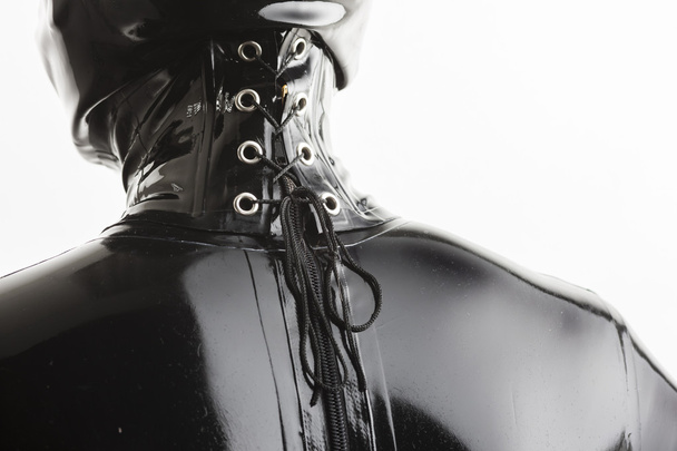 detail of standing woman wearing latex clothes - Photo, Image