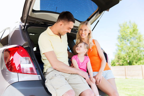 happy family with hatchback car outdoors - Foto, Imagem