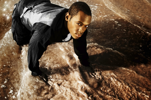 Young man in suit with water - Foto, Imagen