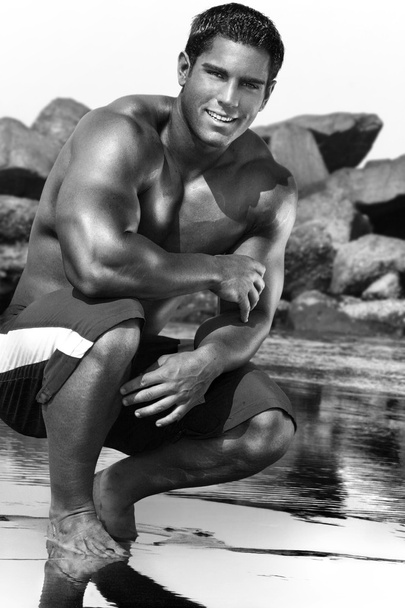 Young man in bathing suit - Valokuva, kuva