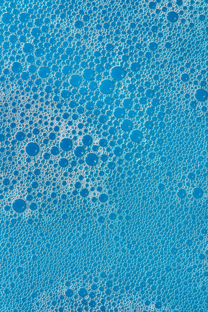 sabun kabarcık makro mavi arka plan ile - Fotoğraf, Görsel