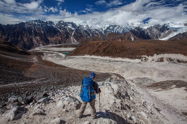 Hiker on the trek in Himalayas, Manaslu region, Nepal - Photo, Image