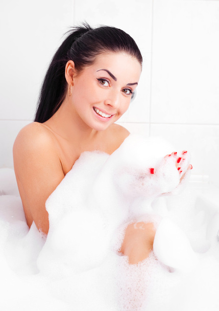 Girl taking a bath - Фото, изображение