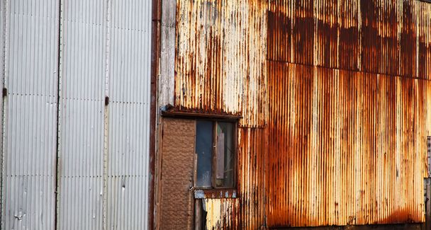 Weathered metal home walls vintage and rusted - Fotó, kép