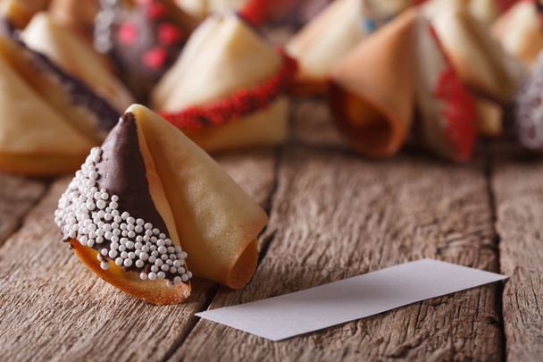Fortune cookie decorated with white candy sprinkles and chocolat - Photo, Image