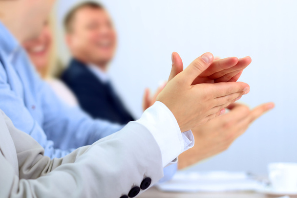 Close-up of business people clapping hands. Business seminar con - Photo, Image