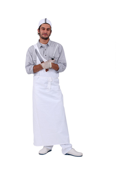 Young apprentice butcher - Фото, изображение