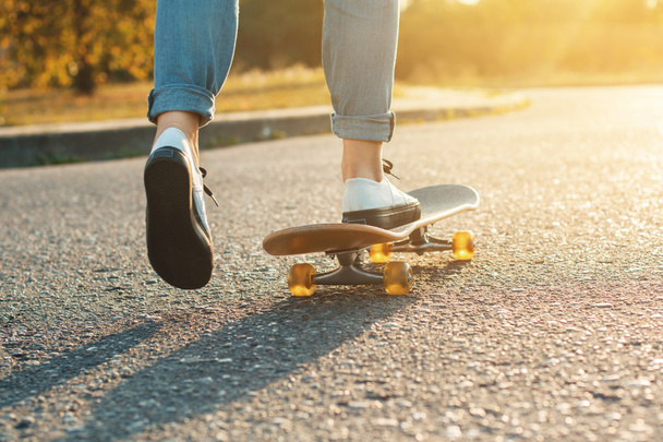 Skateboarding at sunrise. - Foto, imagen