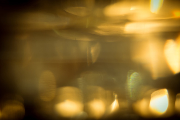 αφηρημένο λαμπερό χρυσό φως glitter για εορταστική γιορτή - Φωτογραφία, εικόνα