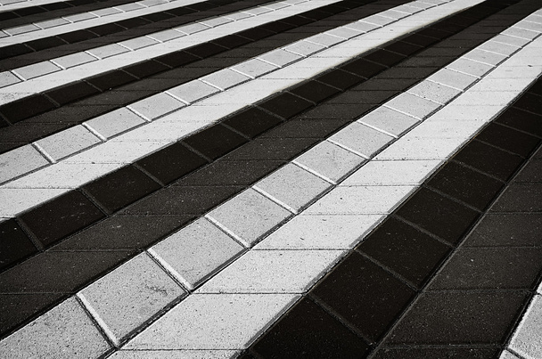 Black and white checkered tile on the street - Fotografie, Obrázek