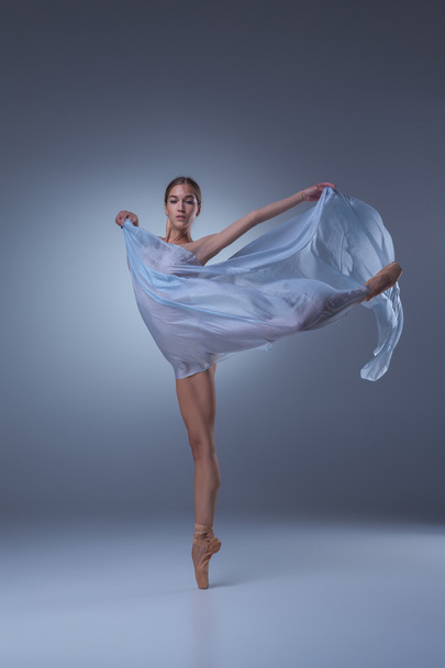 The beautiful ballerina dancing with blue veil - Valokuva, kuva