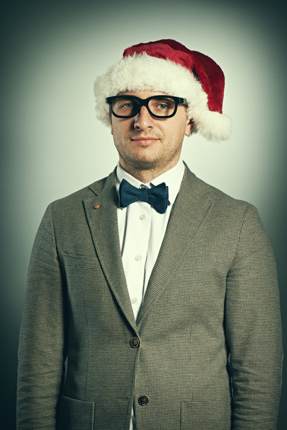 nerd in Santa Claus hat - Zdjęcie, obraz