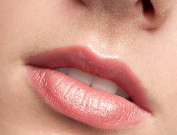 Close-up lips of beauty young woman - Fotó, kép