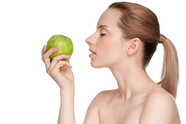 Woman eat green apple - Foto, Imagen