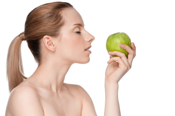 Woman eat green apple - Zdjęcie, obraz