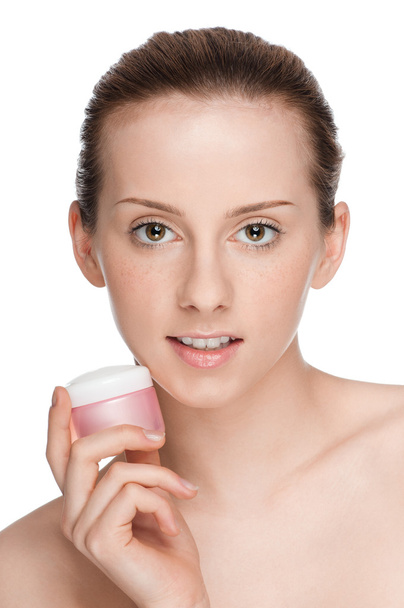 Beautiful woman tender jar of cream - Фото, изображение
