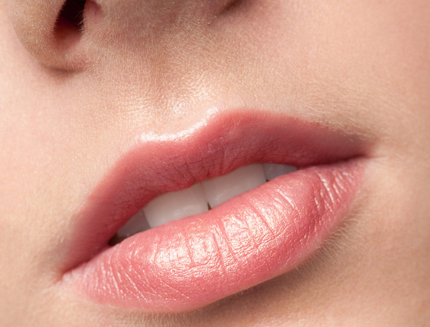 Close-up lips of beauty young woman - Foto, imagen