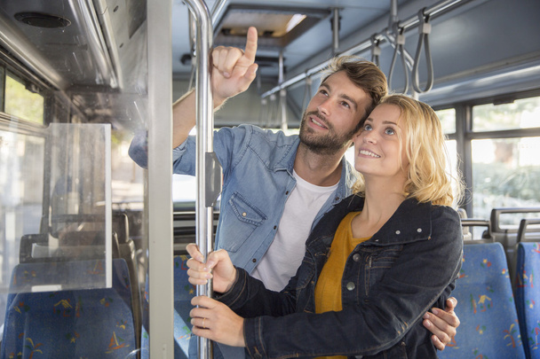young couple go to the public transport - Foto, imagen