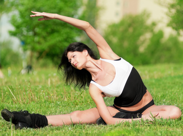 Woman doing stretching exercise. Yoga - Foto, Imagen