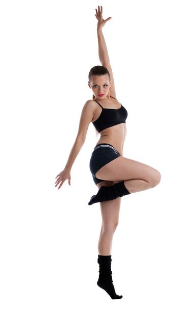 Athletic young woman posing in dance sport costume - Фото, изображение
