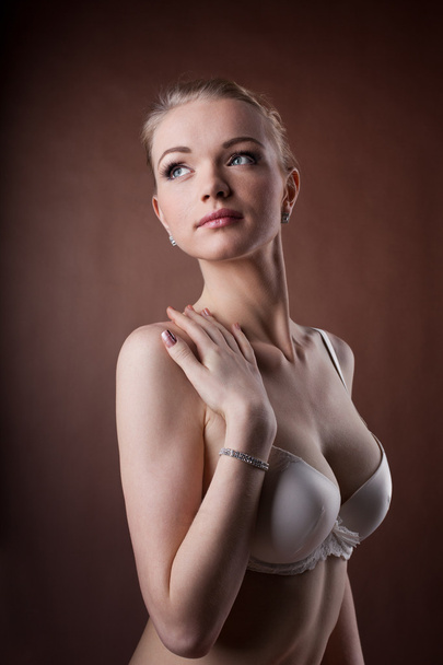 Beautiful woman portrait in white bra - Fotó, kép
