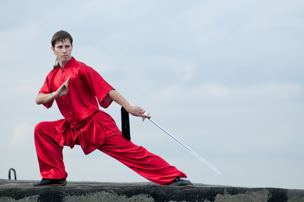 Wushoo man in red practice martial art - Fotoğraf, Görsel