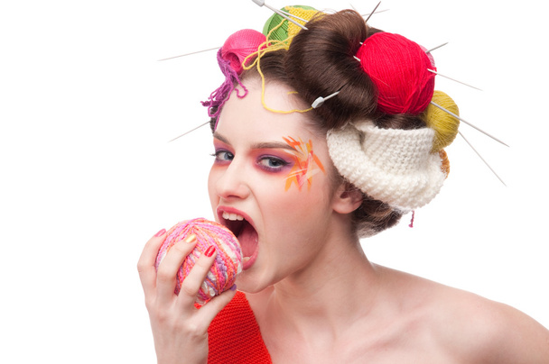 Closeup fashion woman with color face art in knitting style - Foto, Imagen
