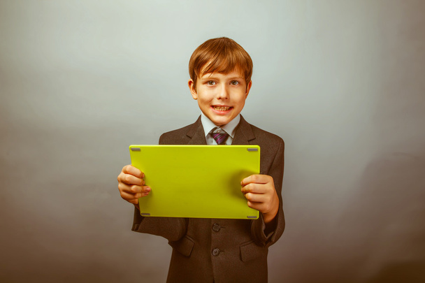 boy teenager dressed businessman holding tablet Photo Studio ret - Photo, Image