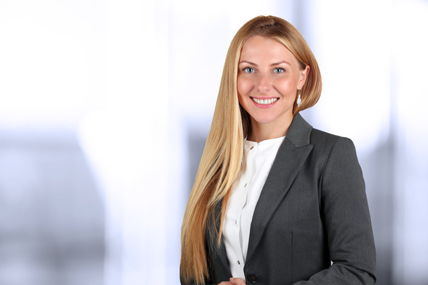 Beautiful smiling business woman  portrait. Isolated on a white - Fotografie, Obrázek