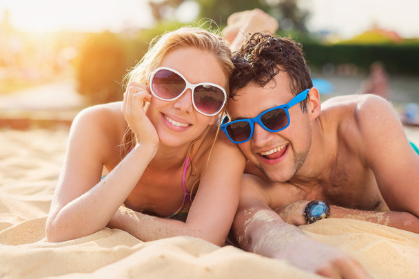 young couple on beach - Photo, image