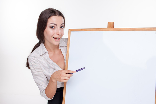 young business woman showing something on the white background - Photo, image