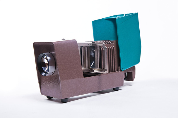 Retro cine-projector on the white background. - Photo, Image